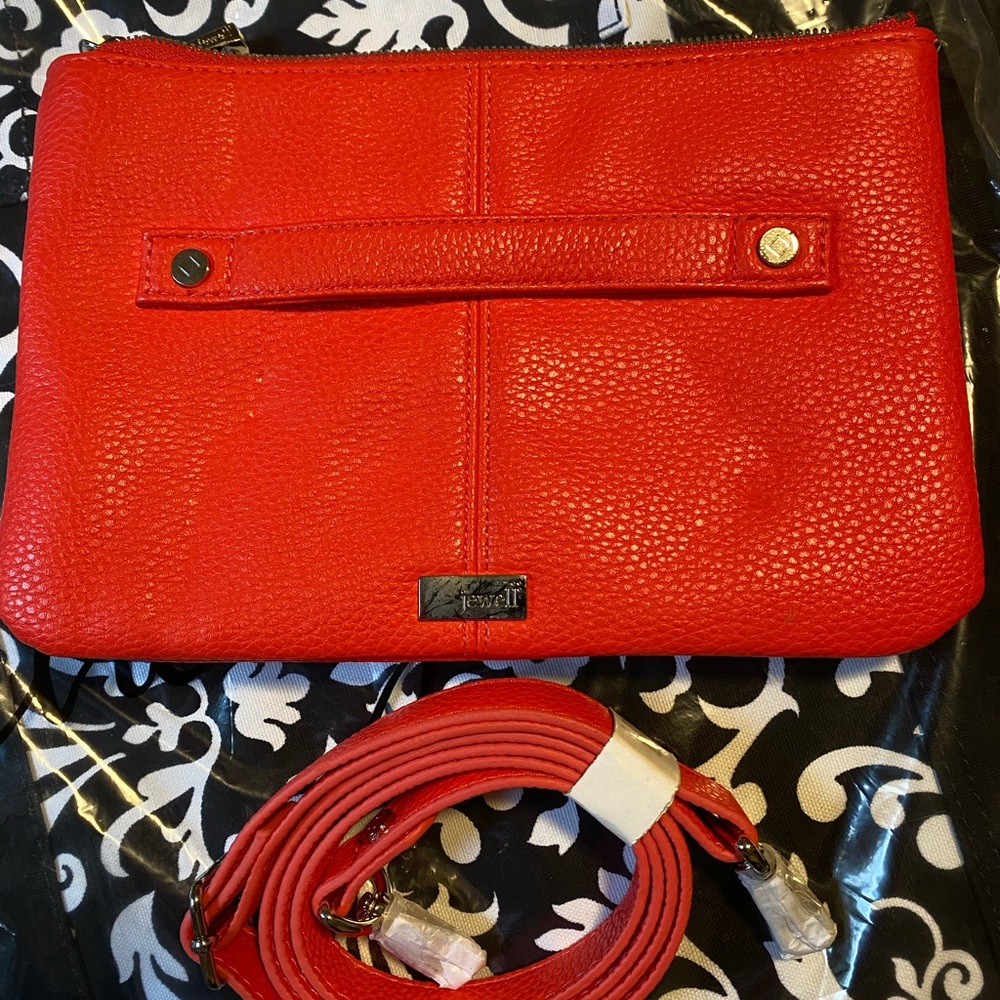 Clutch with strap